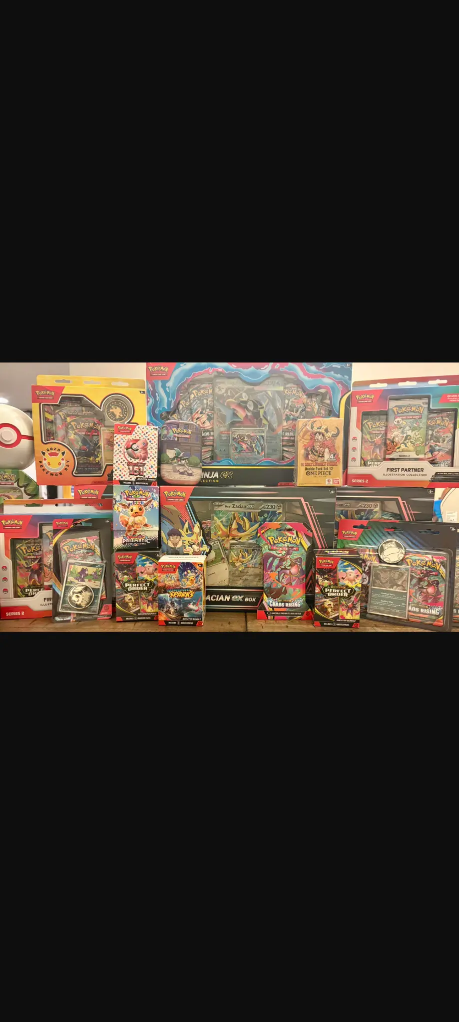 Sealed Pokémon collection boxes and booster packs