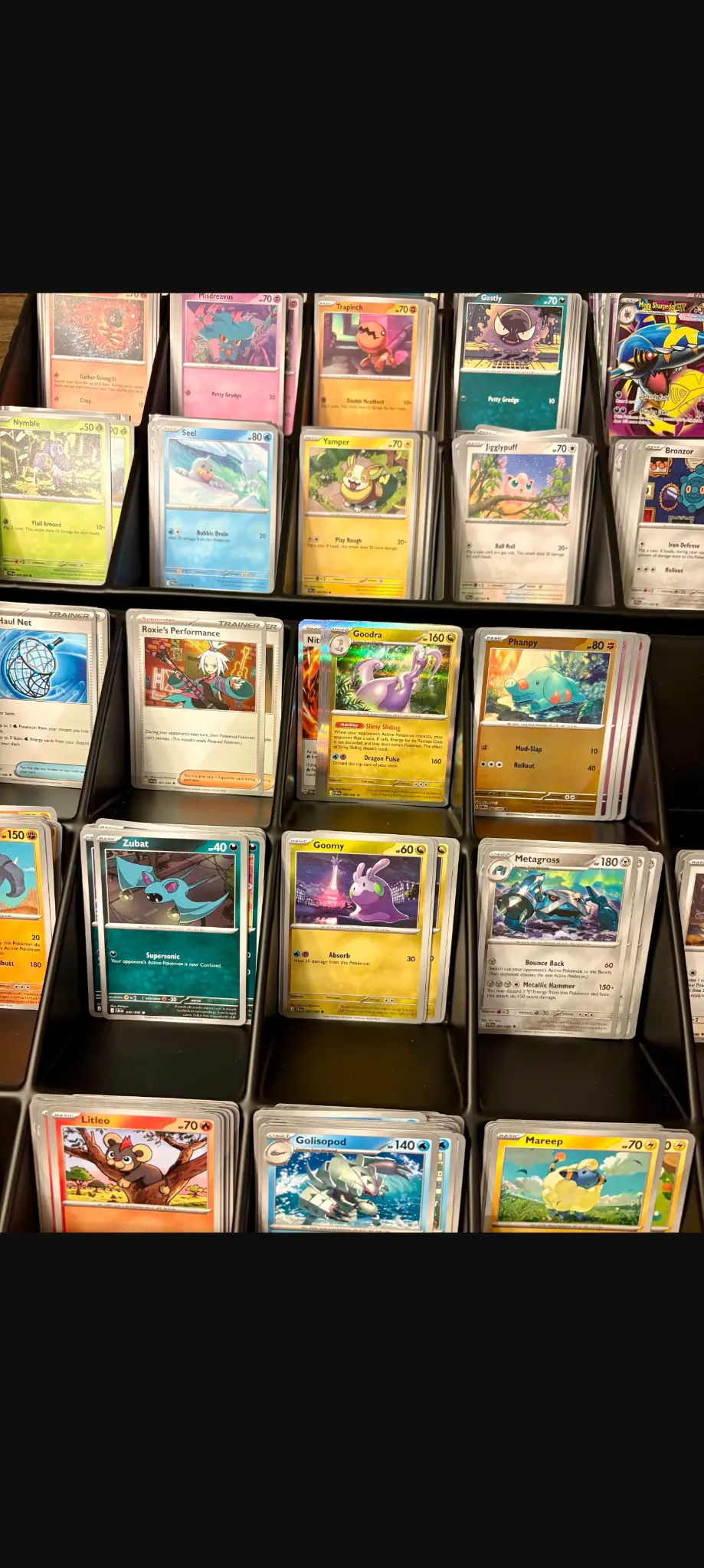 A colorful assortment of Pokémon trading cards