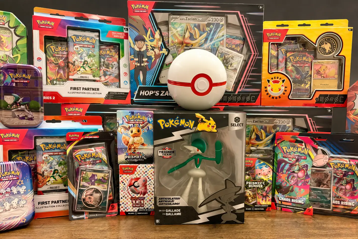 Pokémon sealed products, collection boxes, and booster packs arranged for sale
